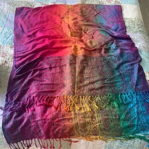 Rainbow color pashmina with a paisley print and tassels